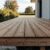 Holzterrasse im Waldviertel aus Lärche mit hinterlüfteter Unterkonstruktion und Punktfundament
